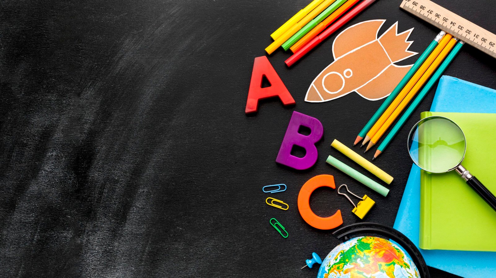flat-lay-school-essentials-with-magnifying-glass-globe